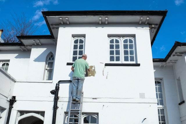 Exterior house painting with high-quality paint for long-lasting protection and curb appeal