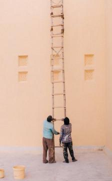 Residential home painting with updated exterior, new trim, and weather-resistant finish